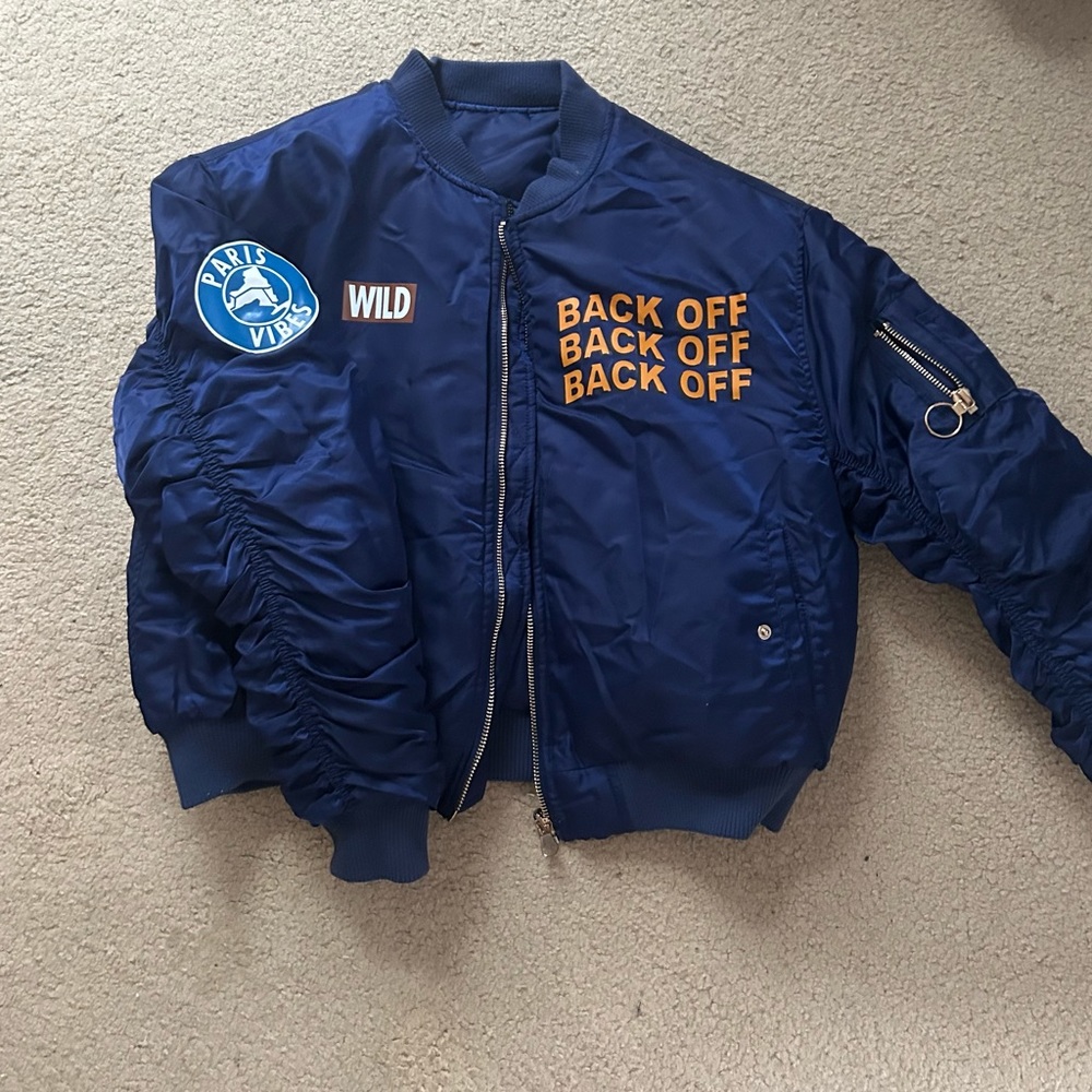 Blue reversible bomber jacket